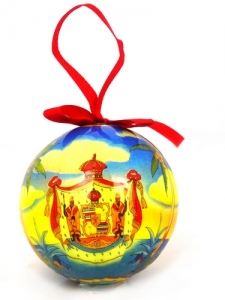 Christmas ball designed with Hawaiian coat of arms with red silk ribbon Christmas ball showing coat of arms of Hawaii